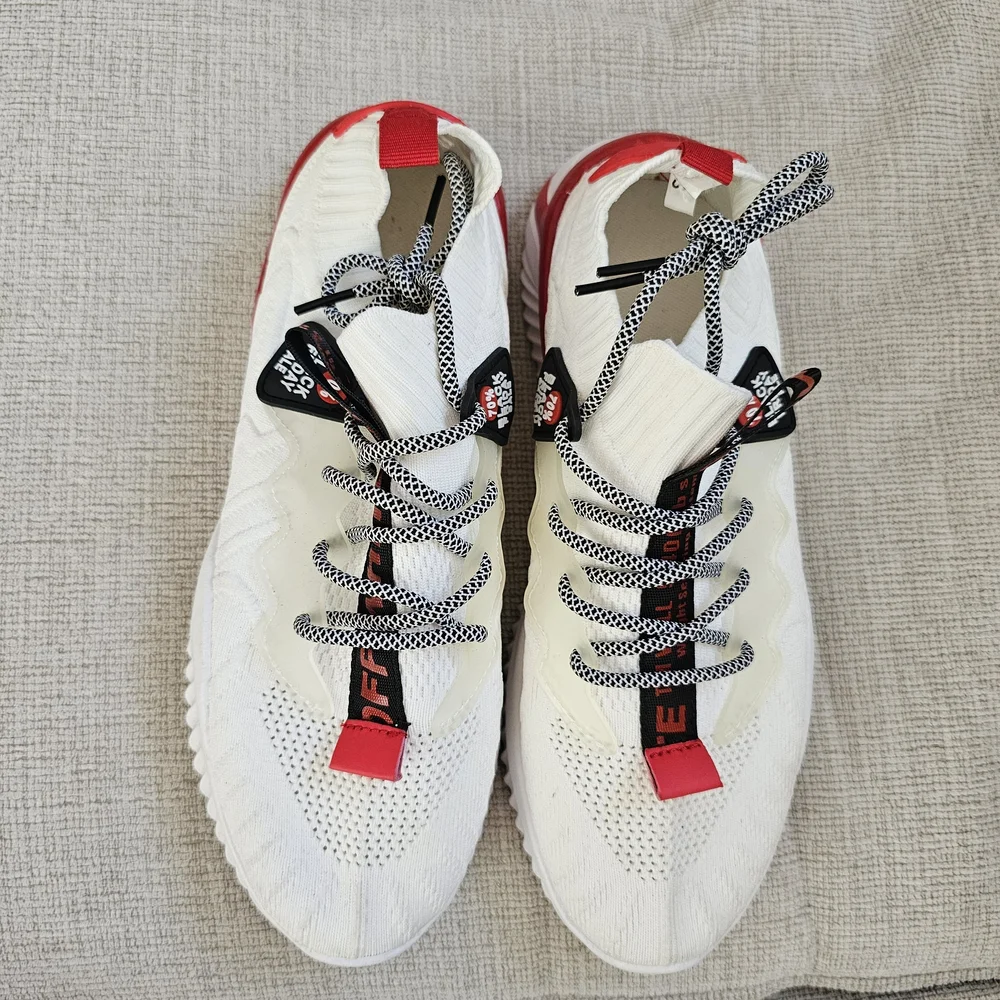 White Sneakers with Red and Black Accents